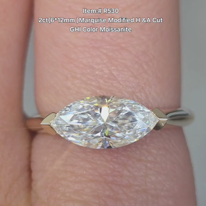 DovEggs Marquise Modified H&A cut  moissanite ring sparkling on hand video.