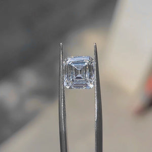 3.02ct Asscher lab diamond (D/VVS1) outdoors, showcasing mirror-like step cuts