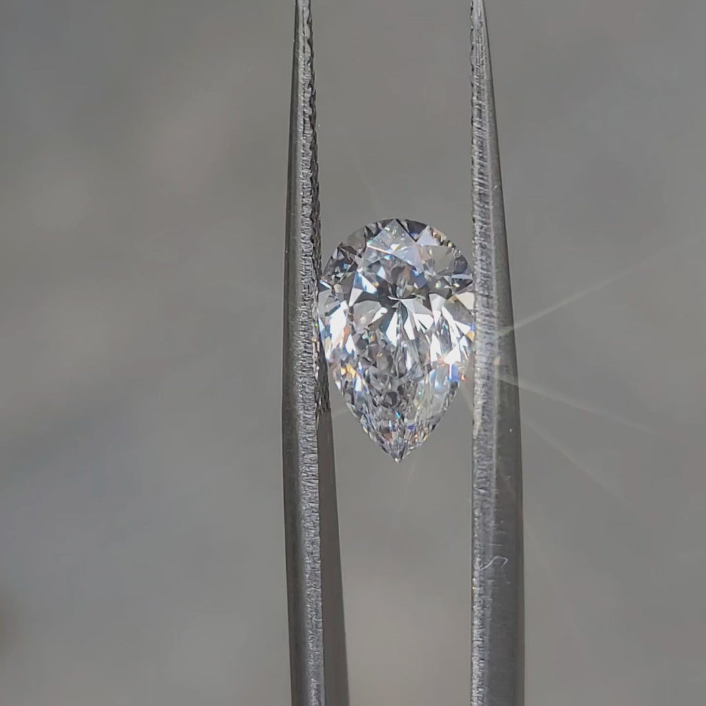 "Sunlight video showing 2.228ct pear cut diamond's teardrop fire"