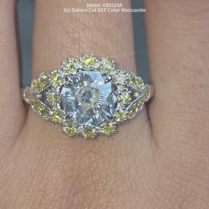 DovEggs 2ct Sakura cut moissanite engagement ring sparkling in sunlight video.