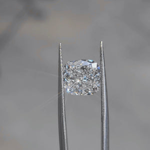 "Sunlight video showing 3.73ct cushion cut diamond's chunky facets"
