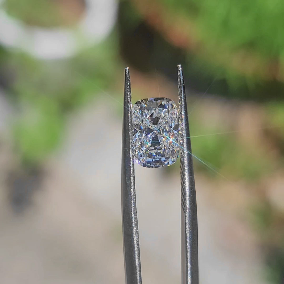 "Outdoor slow-motion video capturing 2.46ct cushion's exceptional light performance"