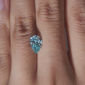 video of 1.620ct blue pear diamond in warm light