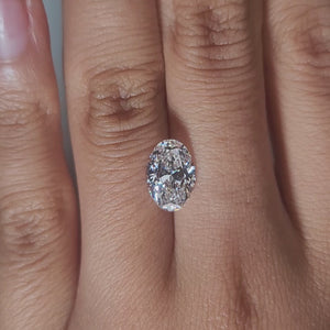 Hand-modeled video of 2.170ct oval diamond in warm indoor lighting