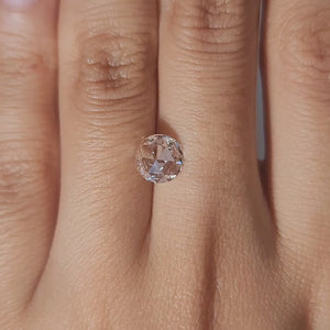 Close-up of 0.93ct rose cut diamond in warm lighting