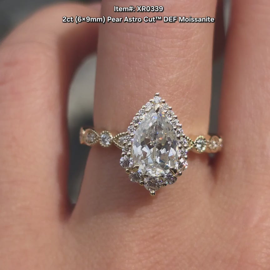 DovEggs DEF color Astro Pear moissanite ring sparkling in sunlight video