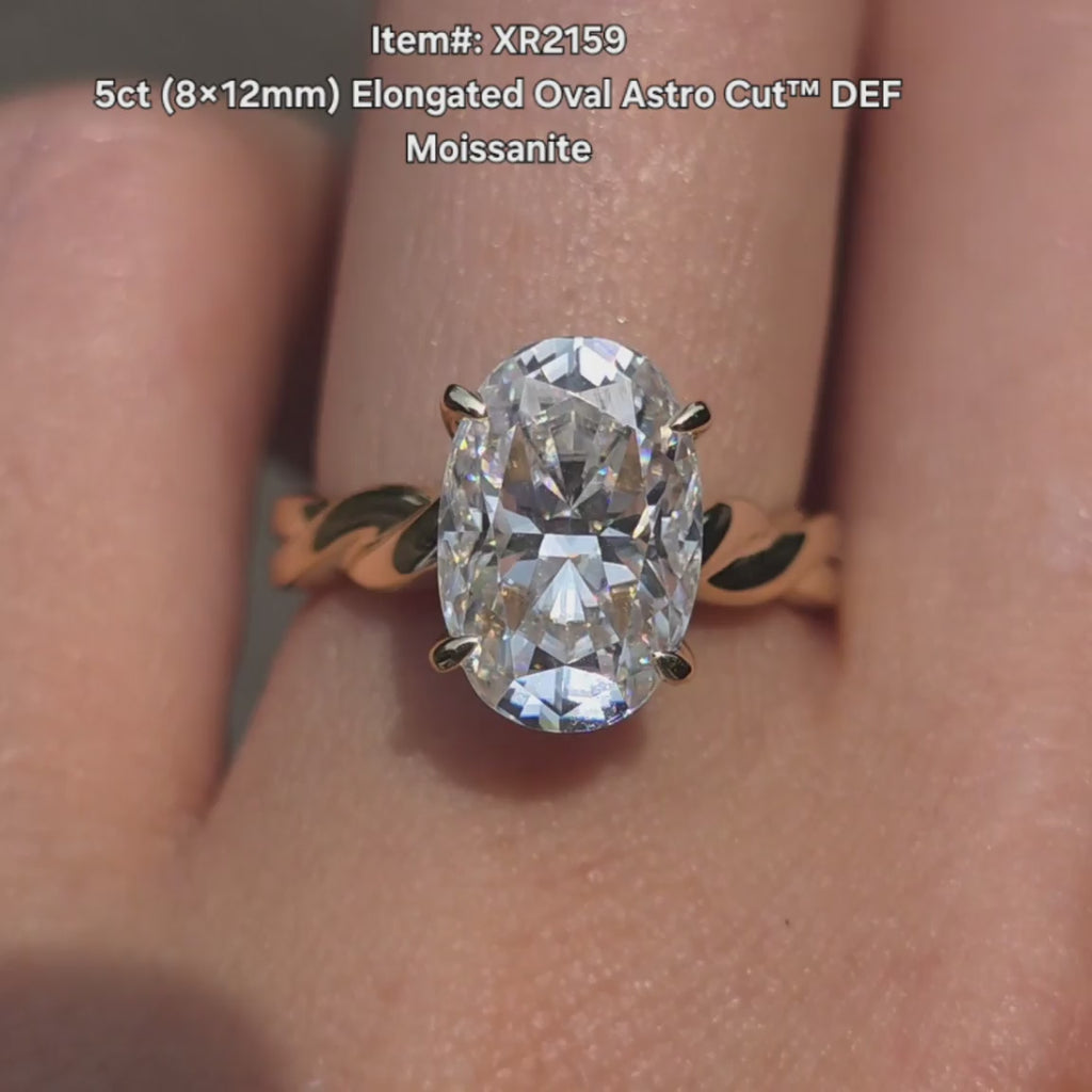  DovEggs Elongated oval Astro moissanite ring sparkling in sunlight video
