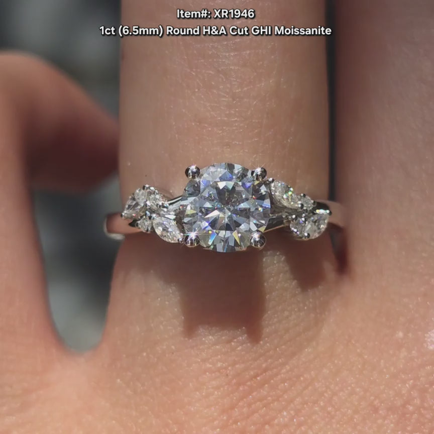 DovEggs H&A cut GHI color round moissanite ring sparkling in sunlight video.