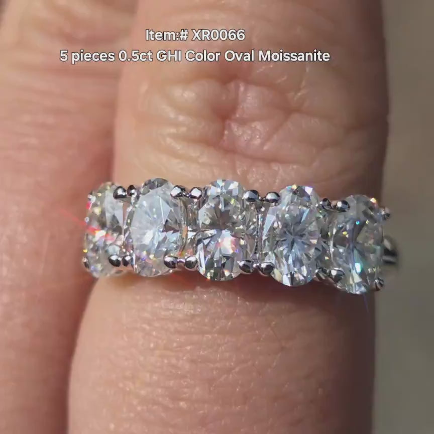 Oval 5 stones moissanite wedding band in sunlight video