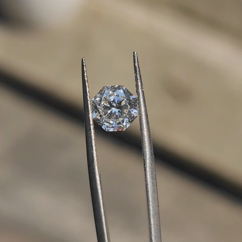 2.01ct modified octagon lab diamond (F/VVS2) in sunlight, showcasing unique facet pattern and brilliance