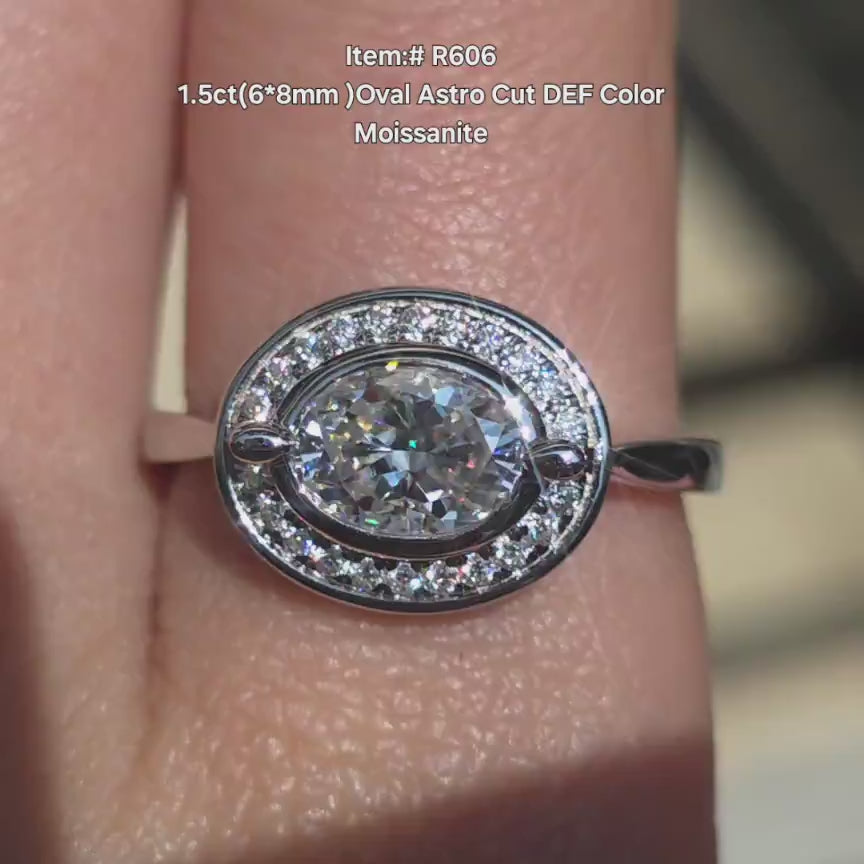 DovEggs oval bezel halo moissanite engagement ring in sunlight video