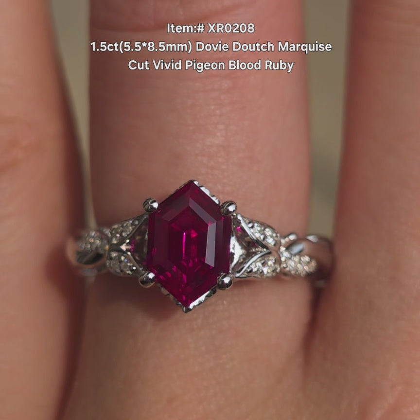 DovEggs Dovie Doutch Marquise cut ruby colored gem ring sparkling in sunlight video.