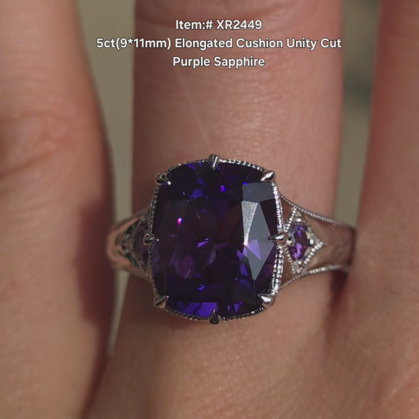 DovEggs cushion unity cut purple sapphire colored gem ring sparkling in sunlight video.