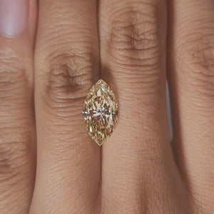 Close-up video of 3.260ct marquise cut's elongated silhouette on hand