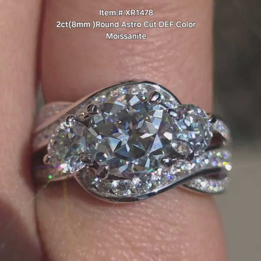 DovEggs round side stones with channel set moissanite engagement ring in sunlight