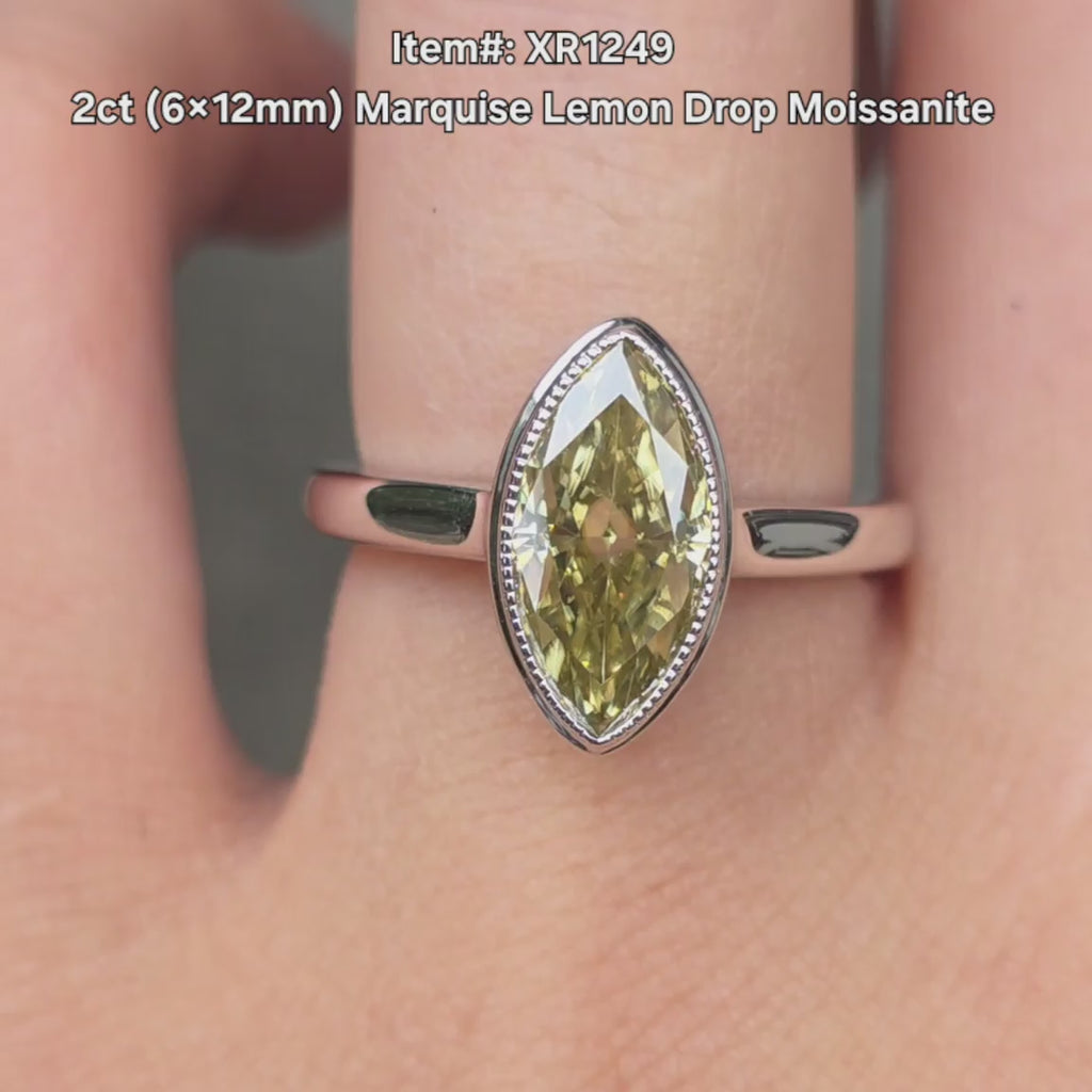 DovEggs Marquise Lemon Drop moissanite ring sparkling in sunlight video
