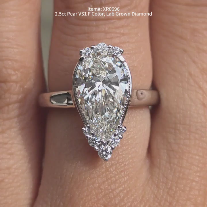 DovEggs Pear lab diamond engagement ring sparkling in sunlight video