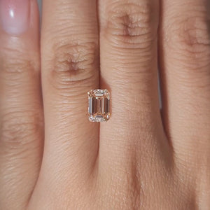 1.61ct Emerald fancy pink diamond in warm ambient lighting