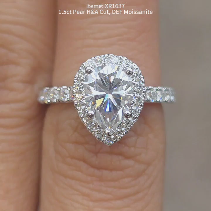 DovEggs H&A cut pear moissanite ring sparkling in sunlight video