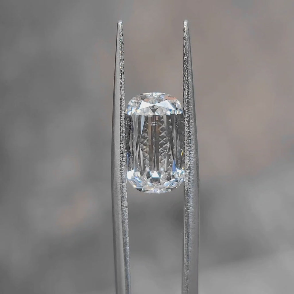 "Sunlight video showing 3.637ct modified cushion cut diamond's elongated sparkle"