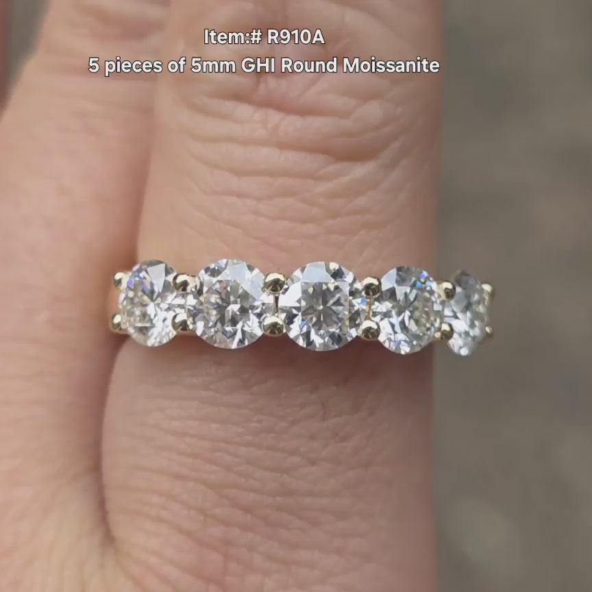 DovEggs round moissanite wedding band sparkling in sunlight video