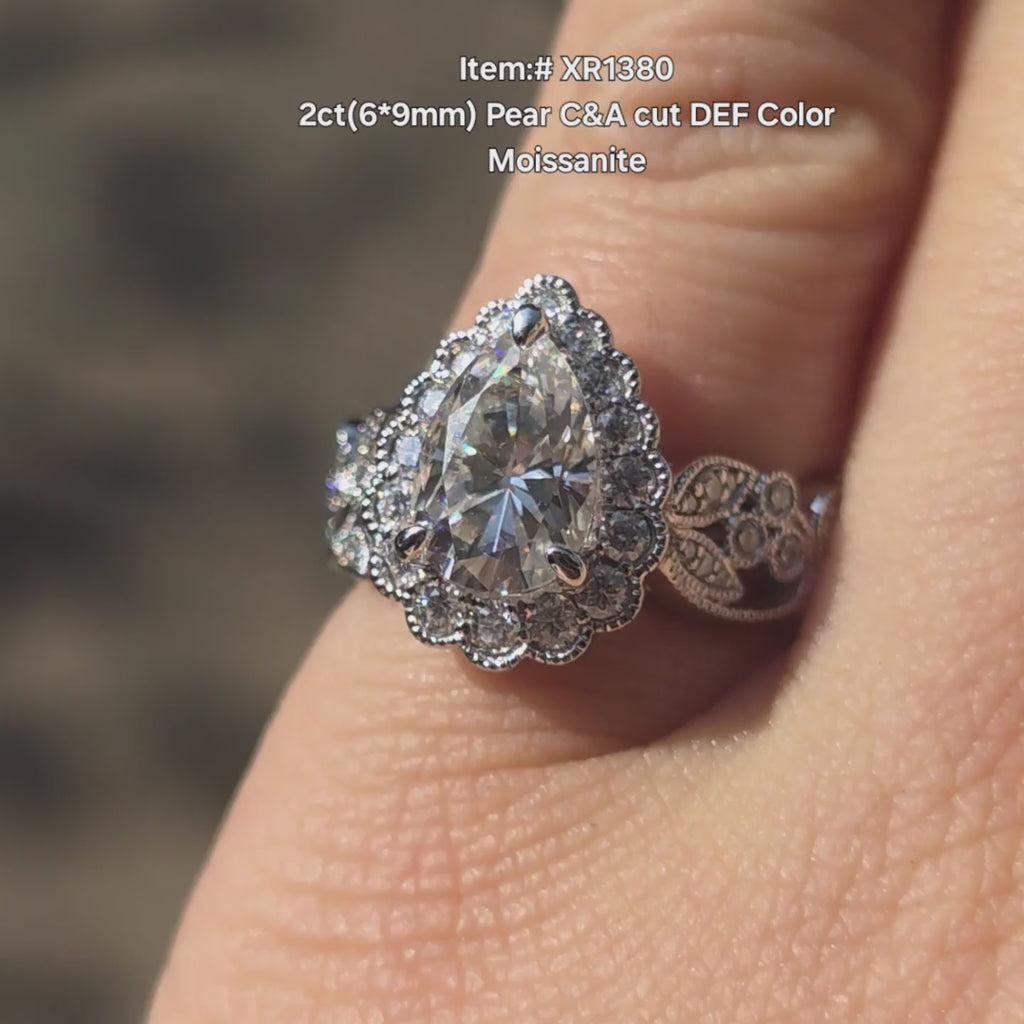  DovEggs C&A pear moissanite ring sparkling in sunlight video