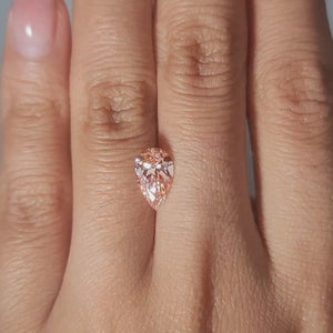 Warm indoor lighting video of 1.54ct pear lab diamond