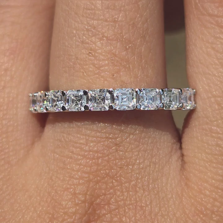DovEggs Asscher cut  half eternity moissanite band on hand video.