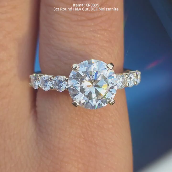 DovEggs round side stone moissanite engagement ring video in sunlight