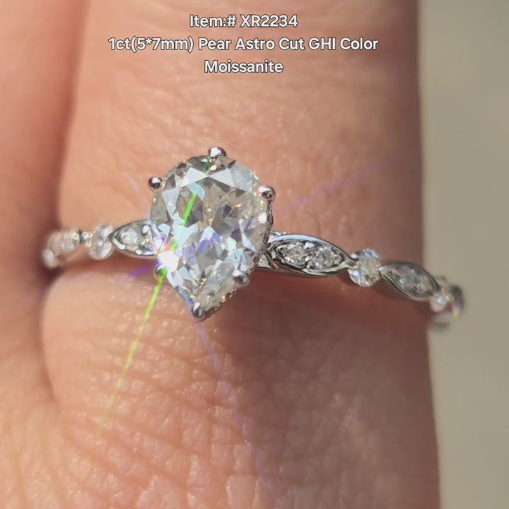 DovEggs 1ct Pear astro cut Moissanite engagement ring on hand video.