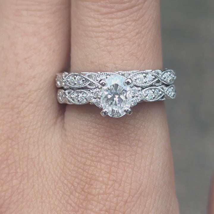 DovEggs GHI color oval Crushed Ice cut moissanite ring sparkling in sunlight video