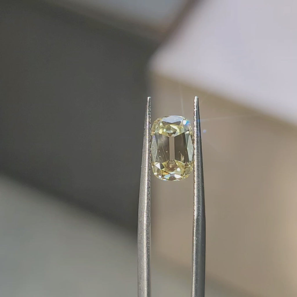 2.09ct Cushion Fancy Vivid Yellow diamond’s vibrant hue in sunlight
