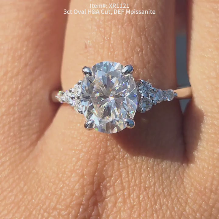 DovEggs H&A cut  DEF color oval moissanite ring sparkling in sunlight video
