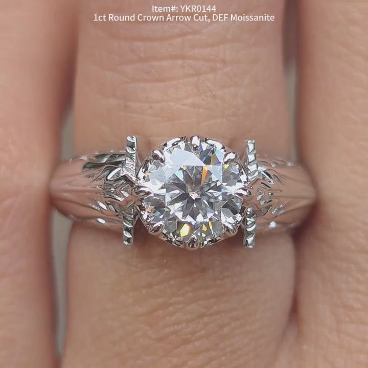 DovEggs 1ct round crown arrow cut moissanite ring sparkling in sunlight video.