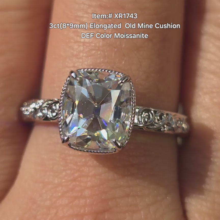 DovEggs Elongated Old Mine Cushion moissanite ring sparkling in sunlight video.