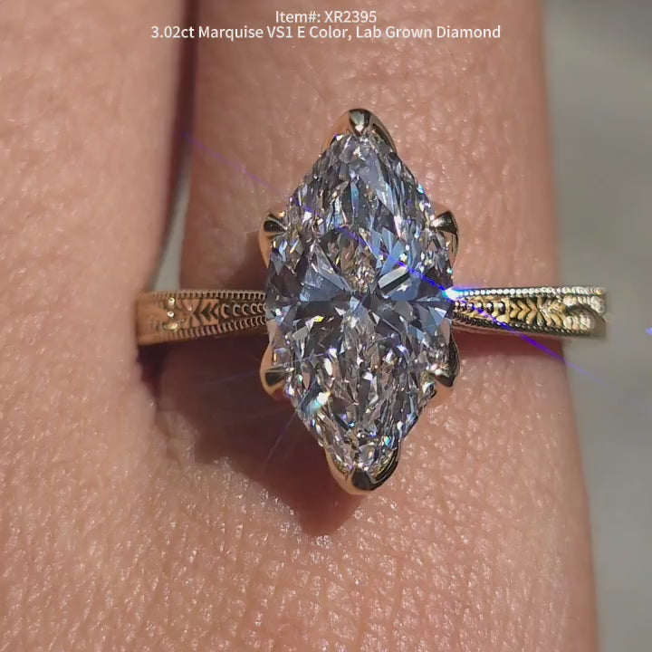 DovEggs marquise solitaire carving lab diamond engagement ring in sunlight video