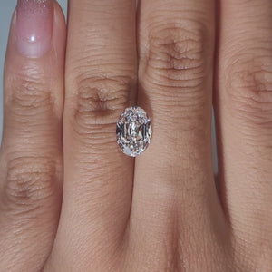 Closeup hand video of 2.07ct Oval lab diamond indoors