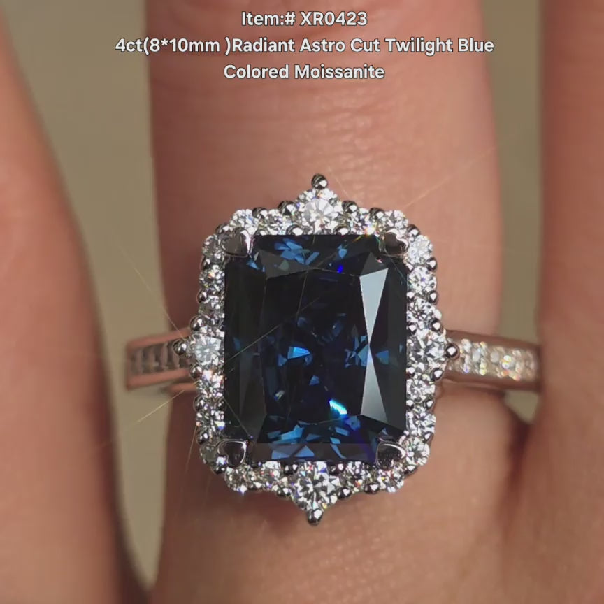 DovEggs Astro Radiant twlight blue moissanite ring sparkling in sunlight video