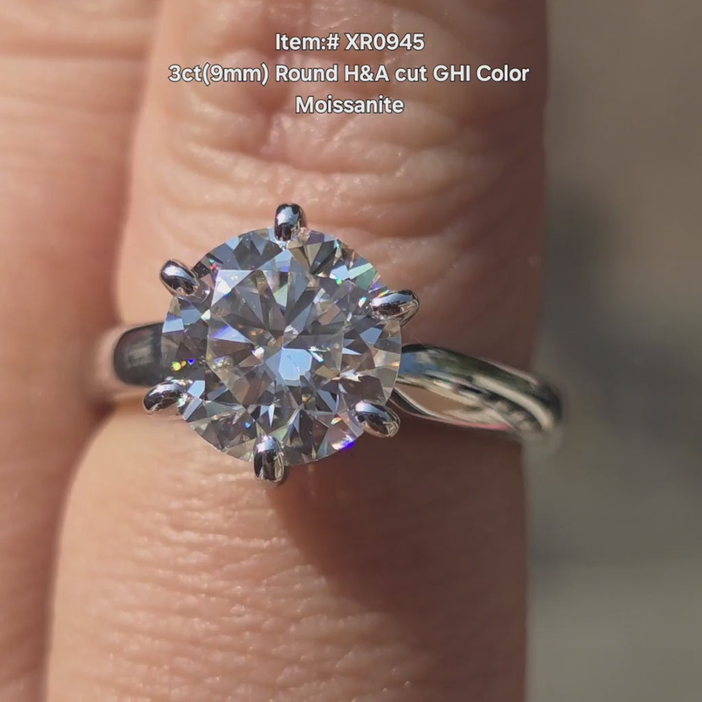 DovEggs H&A round moissanite ring sparkling in sunlight video