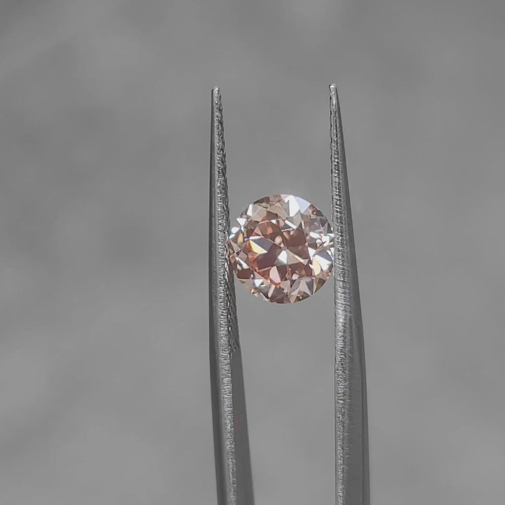 Romantic lighting video of 2.074ct old European cut's pink hue
