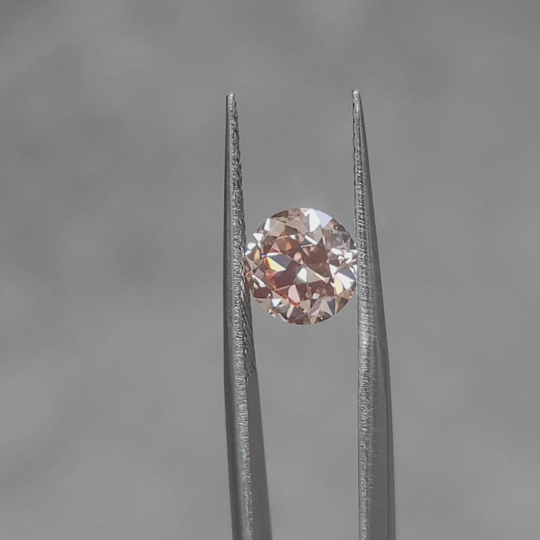 Romantic lighting video of 2.074ct old European cut's pink hue