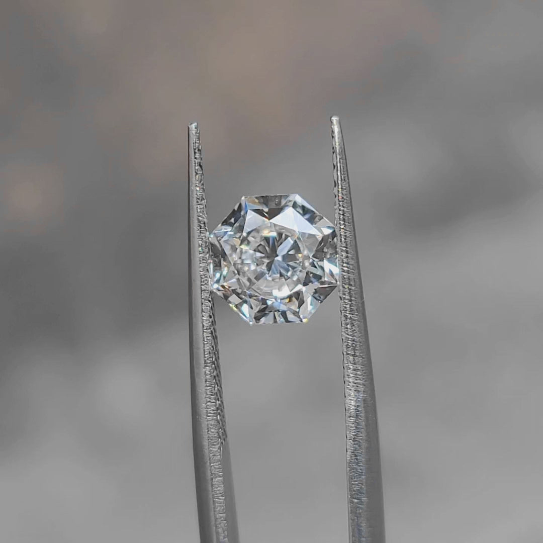"Sunlight video showing 2.103ct modified octagon cut diamond's precise facets"