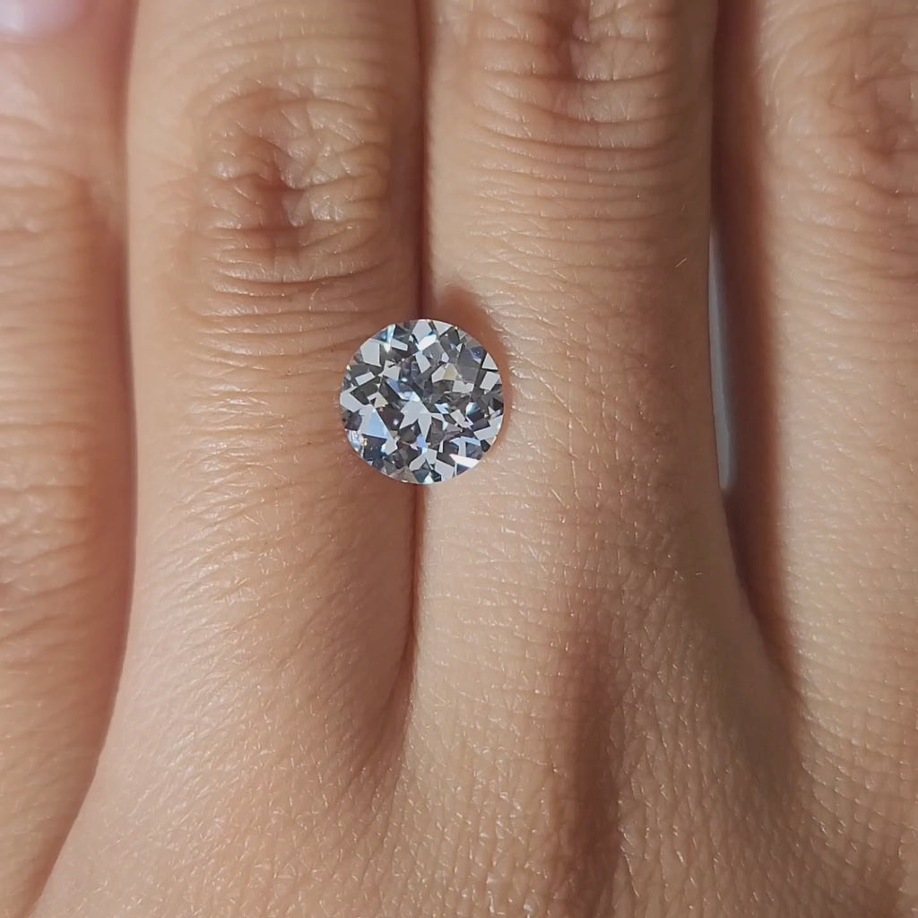 Hand-modeled video of 2.04ct European cut diamond in warm lighting, perfect for antique-inspired engagement rings
