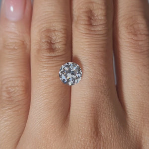 Classic solitaire video of 2.01ct round diamond in warm lighting