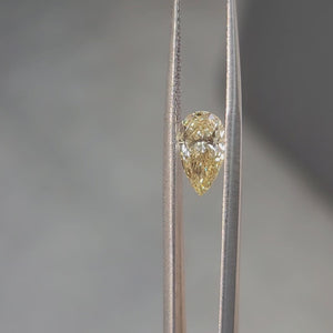 1.67ct pear cut vivid yellow diamond video showing brilliant sparkle in sunlight