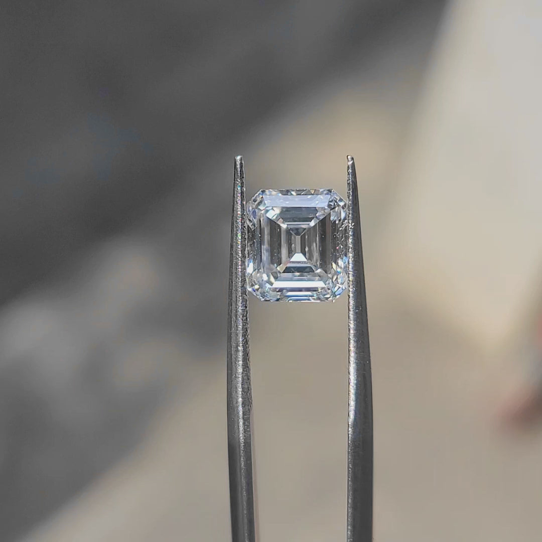 3.05ct Asscher lab diamond (E/VVS1) in sunlight, displaying geometric precision and brilliance