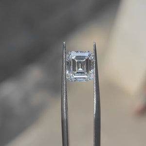 3.05ct Asscher lab diamond (E/VVS1) in sunlight, displaying geometric precision and brilliance