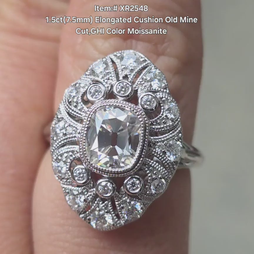 DovEggs Elongated cushion Old Mine cut moissanite ring sparkling in sunlight video.
