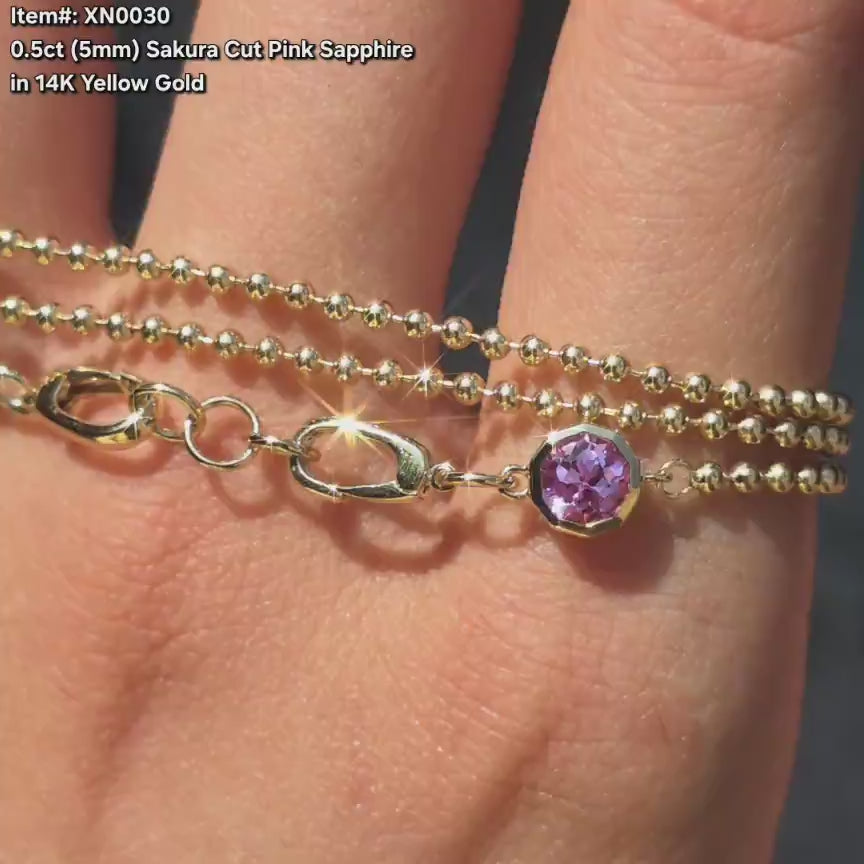  DovEggs sakura cut pink sapphire pendant necklace sparkling in sunlight video