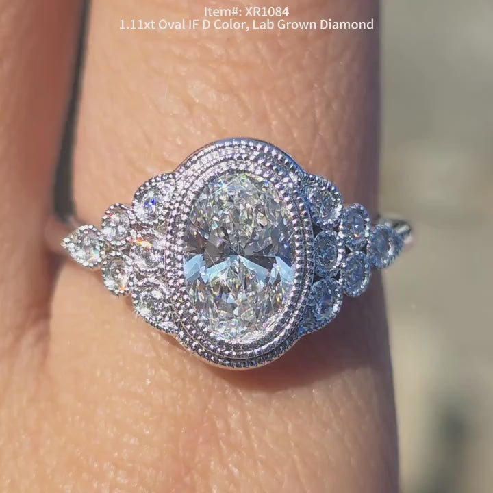 DovEggs oval bezel side stones lab diamond engagement ring video in sunlight